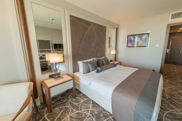 Modern hotel room with big bed