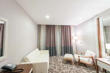 Modern hotel room with big bed