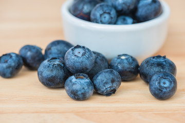 Blueberry on wooden table background