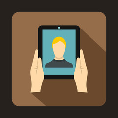 Hands holding a tablet with photo icon in flat style with long shadow. Device symbol