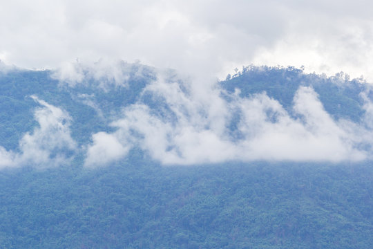 Fototapeta white misty above mountain