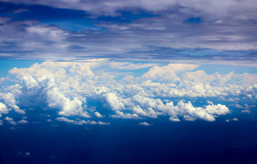Fototapeta na wymiar Sky and cloud view from window of airplane.