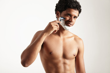Fototapeta premium latin man is shaving