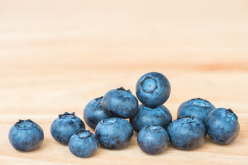 Blueberry on wooden table background