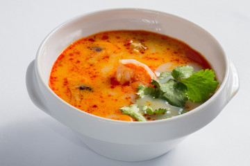 plate of tomato soup with seafood