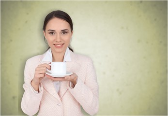 Woman drinks coffee.