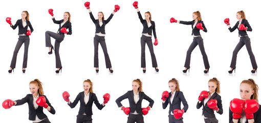 Woman businesswoman with boxing gloves on white