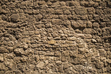 Real old brown brick wall background. Horizontal photo of beautiful rough  weathered surface of...