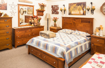 display of a luxury bedroom in a furniture store