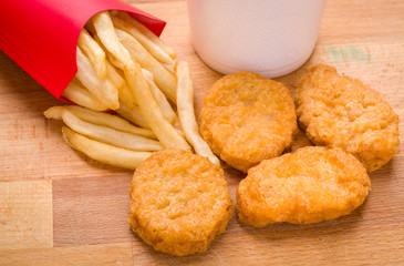 Kids, child golden brown chicken nuggets and French fries meal o