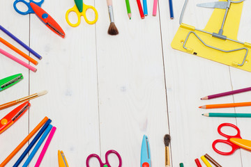 children's scissors and colored pencils