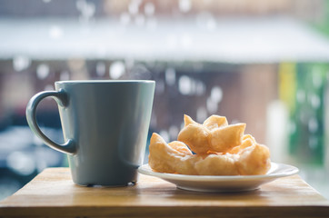 Coffee with fried bread stick, Thai style food.