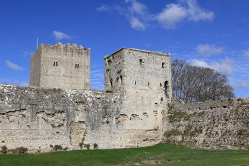 Fototapeta na wymiar PORTCHESTER, HAMPSHIRE, ENGLAND, 30 MAR 2015: Portchester Castle is a medieval castle built within a former Roman fort at Portchester to the east of Fareham