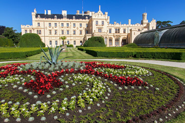 Fototapeta premium Romantic castle Lednice with flower garden at summer day, Czech republic