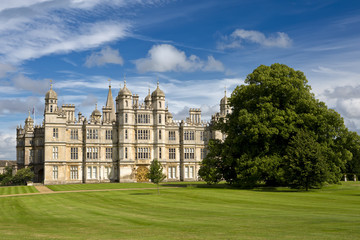 Burghley House in Stamford, England. It is a landmark medieval castle in Central England