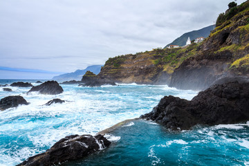 Fototapeta na wymiar Seixal ocean natural pools and bay at Madeira northern coastline. Portugal.
