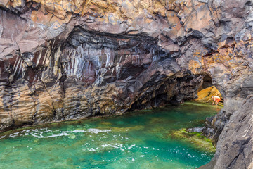 Seixal ocean natural pools and bay at Madeira northern coastline. Portugal.
