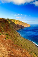Beautiful Madeira landscape with azure water and green cliffs, Portugal
