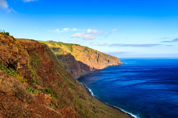 Beautiful Madeira landscape with azure water and green cliffs, Portugal