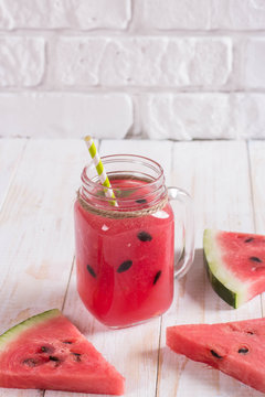Smoothies Of Watermelon Juice In Glass Jar With Straw. Fresh Red