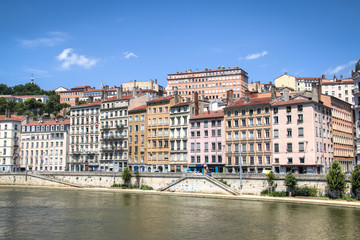 Fototapeta na wymiar Colorful houses on the banks of the Saone river in Lyon, France 