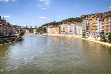 Fototapeta na wymiar Colorful houses on the banks of the Saone river in Lyon, France 