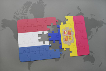 puzzle with the national flag of netherlands and andorra on a world map background.