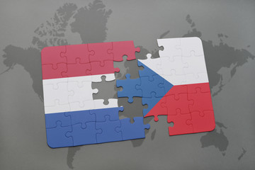 puzzle with the national flag of netherlands and czech republic on a world map background.