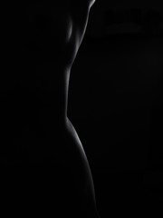 Naklejka premium Beautiful nude woman body pose in the night