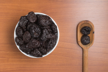 Prunes into a bowl