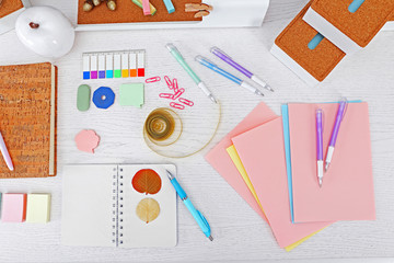 Office and school set with stationery and notebooks on a table