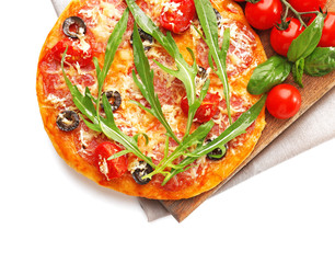 Delicious pizza with vegetables and herbs, isolated on white