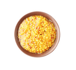 Bowl of French mustard isolated on white