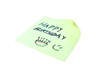 Post it with happy birthday written on a white background