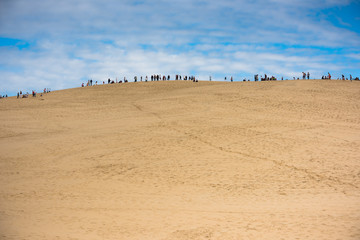 People visiting the highest sand dune in Europe Dune of Pyla