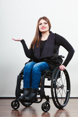 Obraz na płótnie Canvas Disabled young girl on wheelchair.