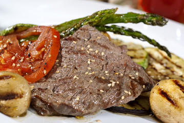 Argentine cut of meat bathed in traditional sauce served with ve