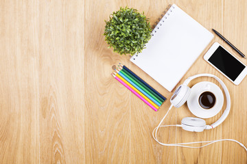 Stationery, headphones and phone