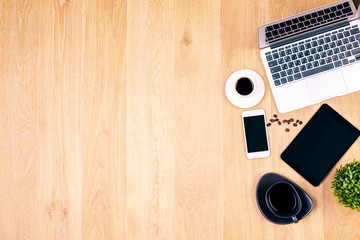 Coffee and technology on desk