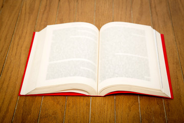 colorful books on wooden table