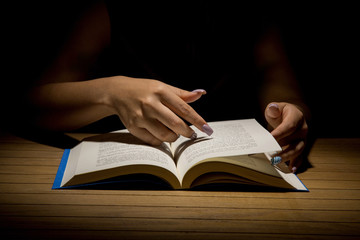 Open Book on wood background