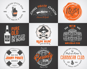 Set of vintage handcrafted pirates emblems, labels, logos. Isolated on a scratched paper background. Sketching filled style. Pirate symbols - old rum bottles, barrels, skull, pistol. Vector