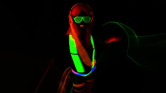 cyber raver dancer babe in fluorescent clothing