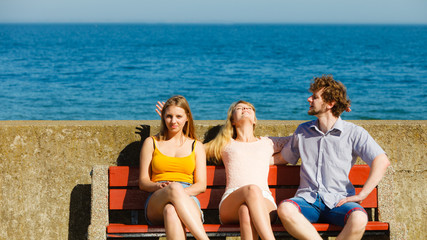 Fototapeta premium Three happy young people friends outdoor.