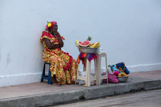 Woman sells fruits in the streets of Cartagena Colombia