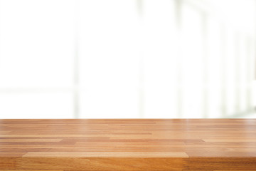 Empty wooden table and modern library background