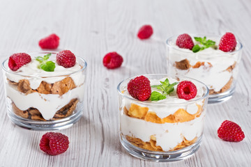 homemade yogurt in cups with whole grain flakes