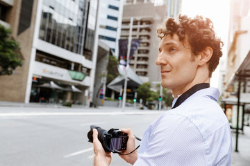 Male photographer taking picture