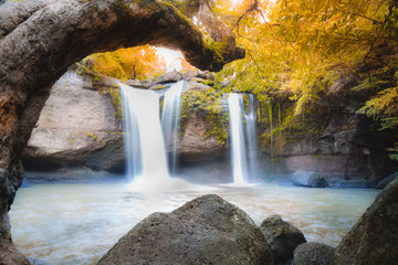 Fototapeta na wymiar Amazing beautiful waterfalls in autumn deep forest at Haew Suwat Waterfall in Khao Yai National Park, Thailand