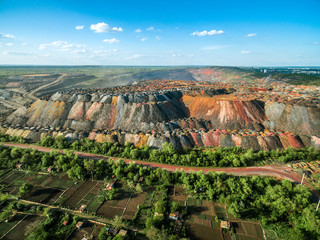 beautiful landscape with multicolored rock dumps from quarries, aerial photo